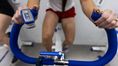 Person riding stationary bike