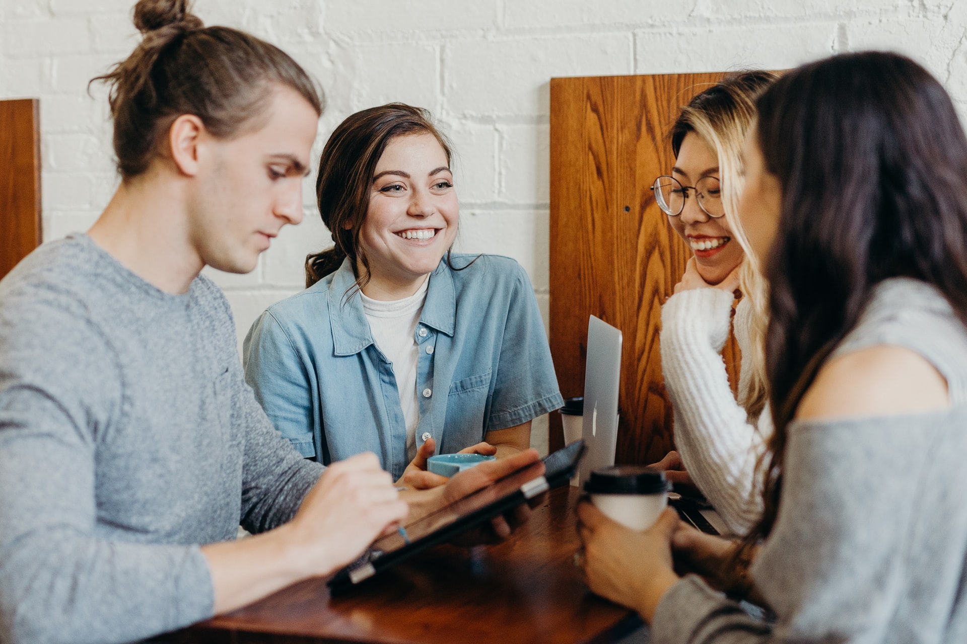 Group of people smiling and chatting