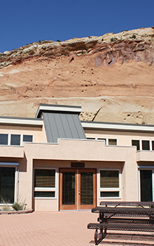 Field Station with the red rock cliffs behind it.