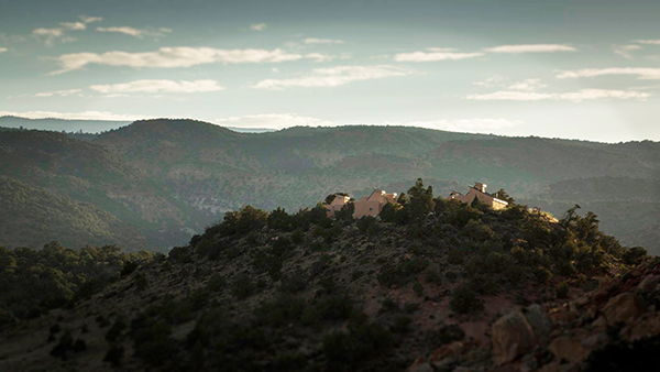 CRFS from a distance showing it perched atop a hill.