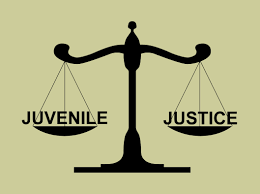 Scales weighing the words juvenile and justice