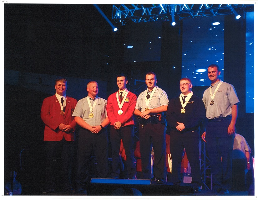 medal winners standing on stage at Nationals
