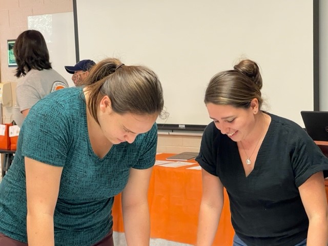 two students collaborating on an assignment.