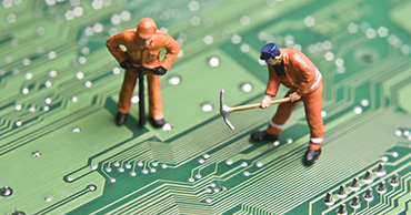 graphic of men in construction suits working on a motherboard