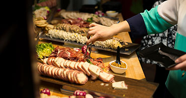 chef assembling trays of food