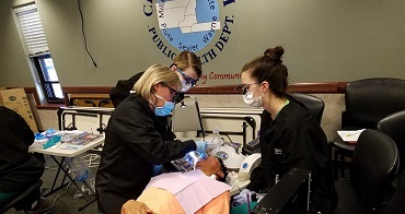 Dental Hygiene students with patient at Capitol Reef Excursion