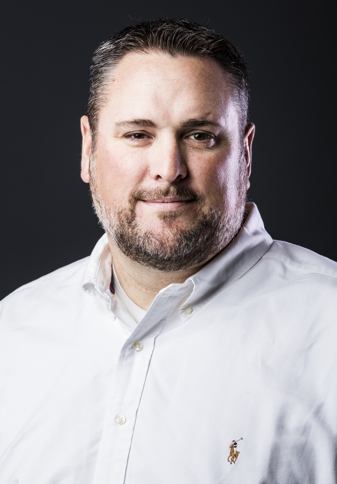 A professional picture of Adam Black