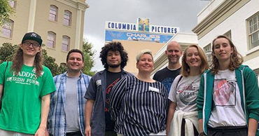 Group picture in front of building exterior