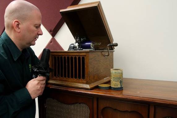 Professor Mike Wisland recording wax cylinders with a microphone