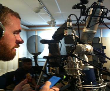 Student Grant Matheson recording himself on a variety of microphones UVU Digital Audio owns