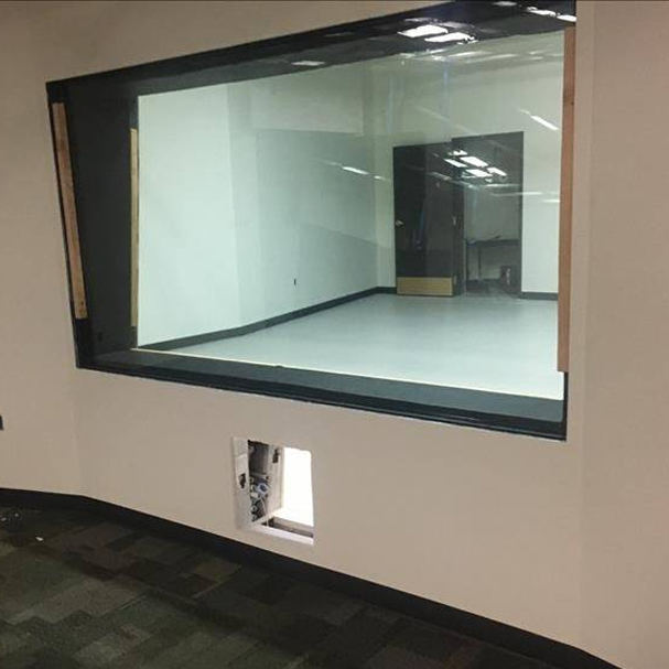 Control Room One with a wall and a window on Studio A