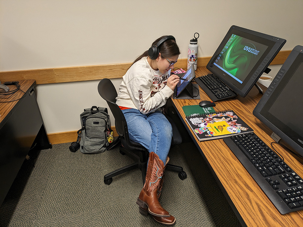 Animation student using a tablet