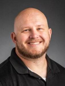Photo of Bryan Sansom male with shaved head