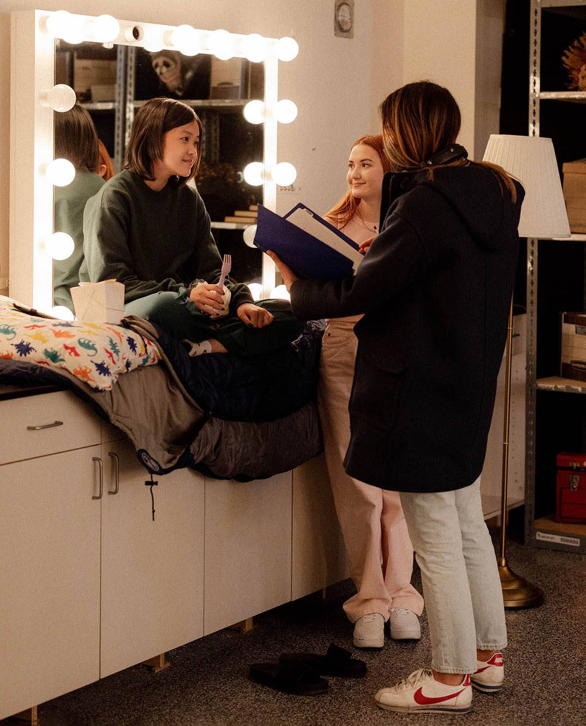 FEMME Director Lynn Chen on set with actors Grace Lu and Thea Saccoliti