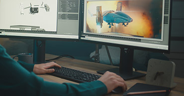man creating a 3d image on a computer