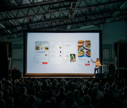 person giving a presentation on stage