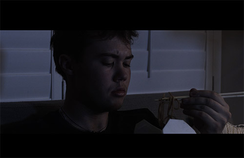 a man eating chinese takeout