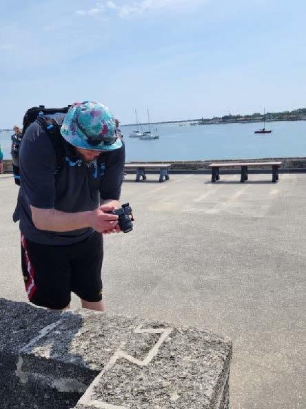 student taking photos