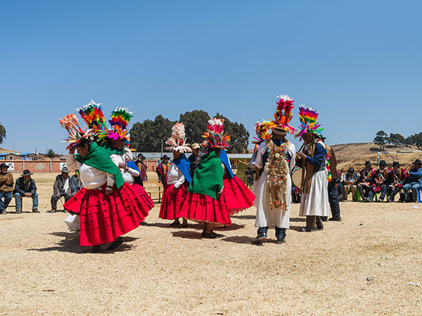 people dancing in a field