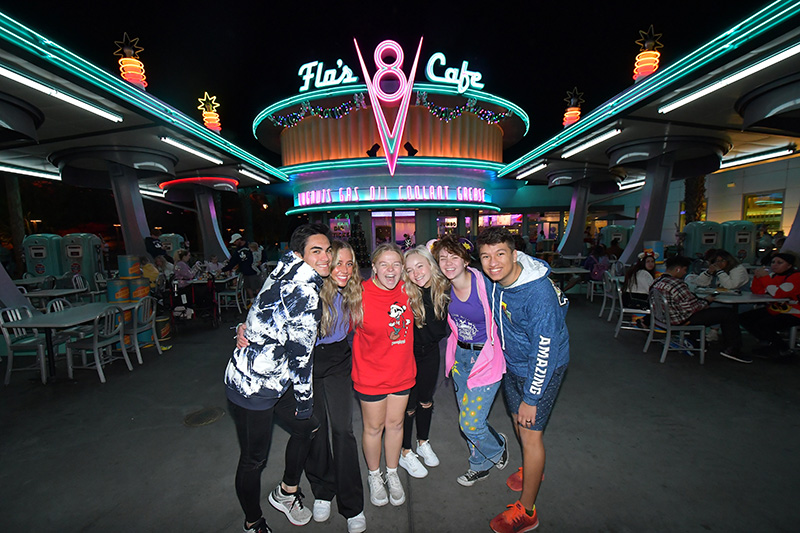 students in front of flos cafe in disneyland