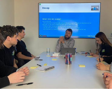 People having a meeting around a table