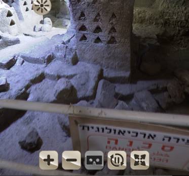 Screen capture showing VR symbols on top of a picture of ancient dovecotes with a sign in Hebrew
