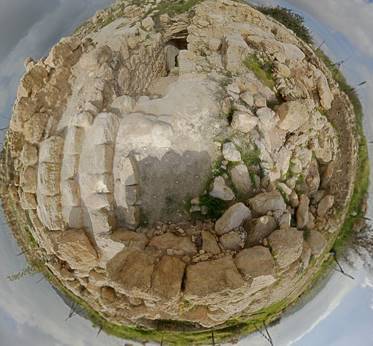 A 360 degree view of an opening to an underground cave system from above