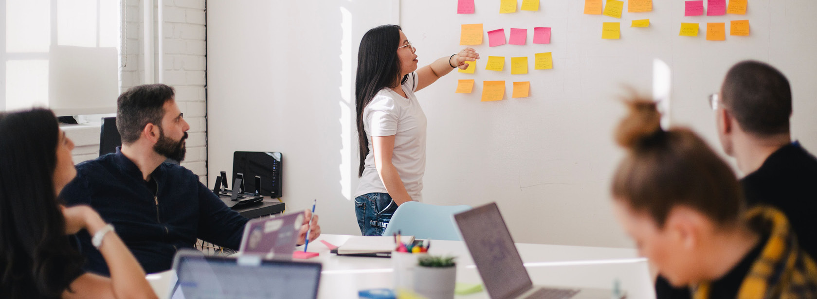 A woman leading a meeting.