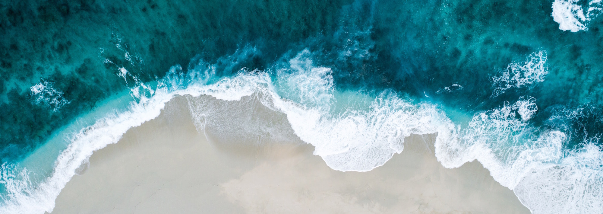 A beautiful blue beach to relax on.