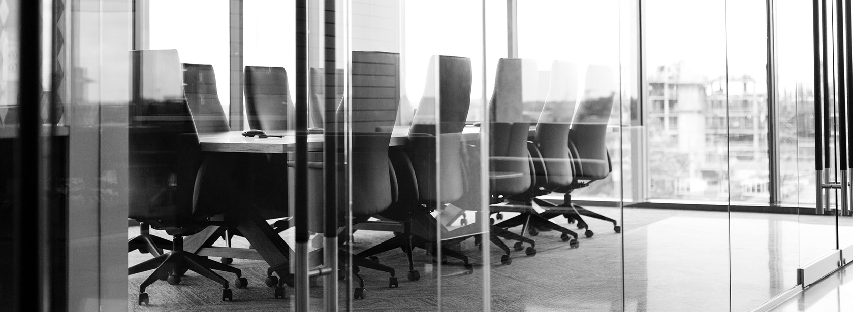 A conference room in grayscale.