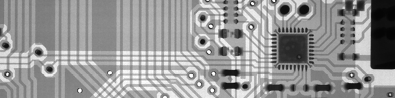 A black and white circuit board. 