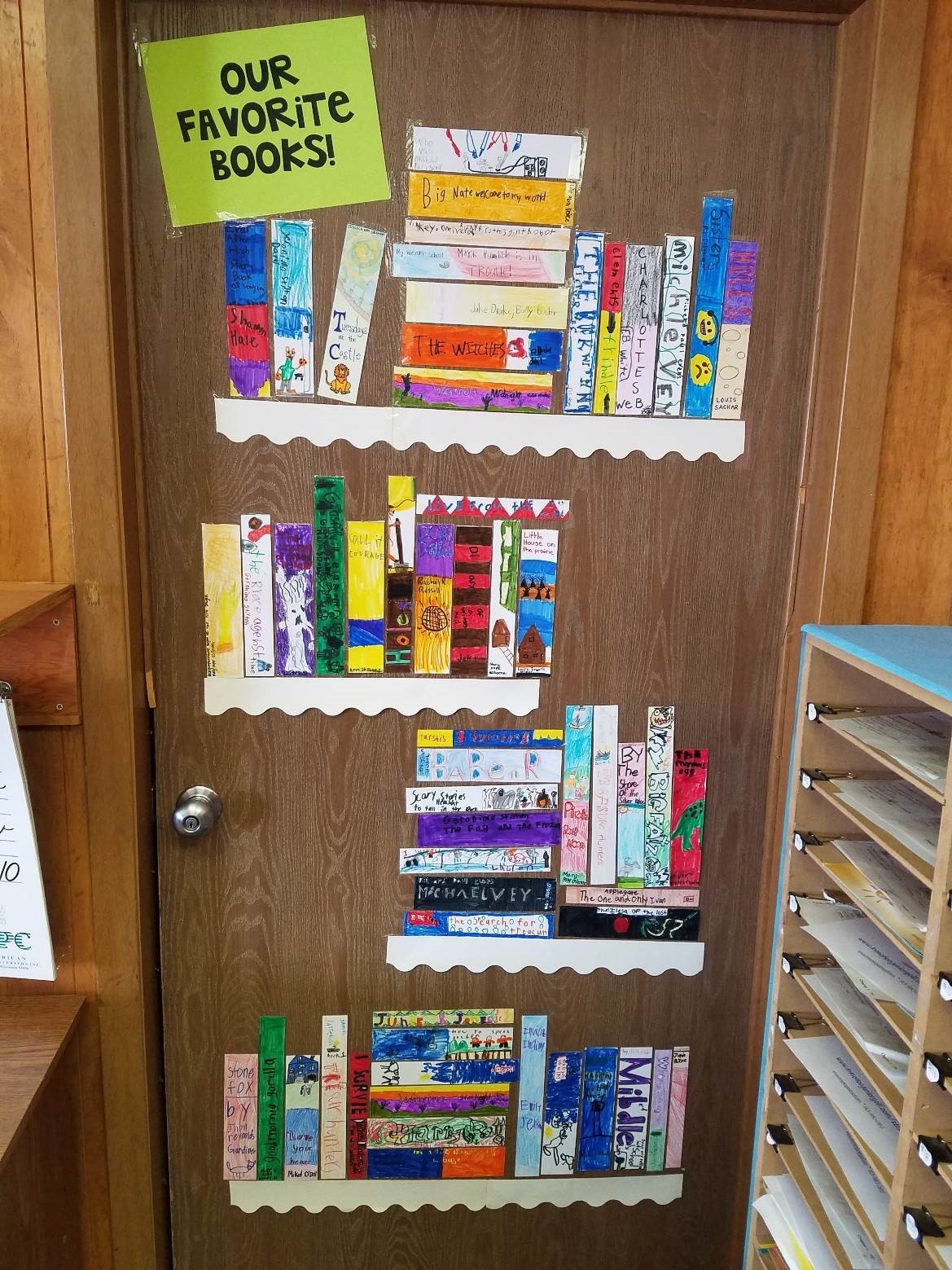 Students favorite books posted on a bulletin board