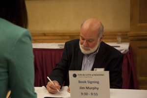 Author Jim Murphy signing books