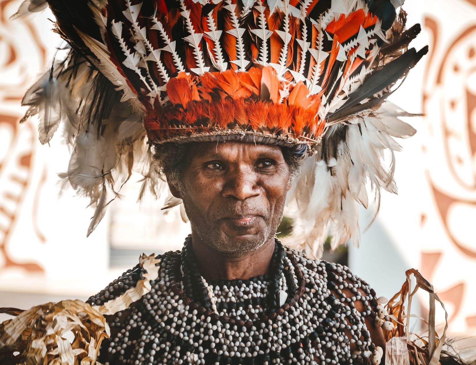 Tribal Leader with Feather Headdress - Photo by Adli Wahid on Unsplash