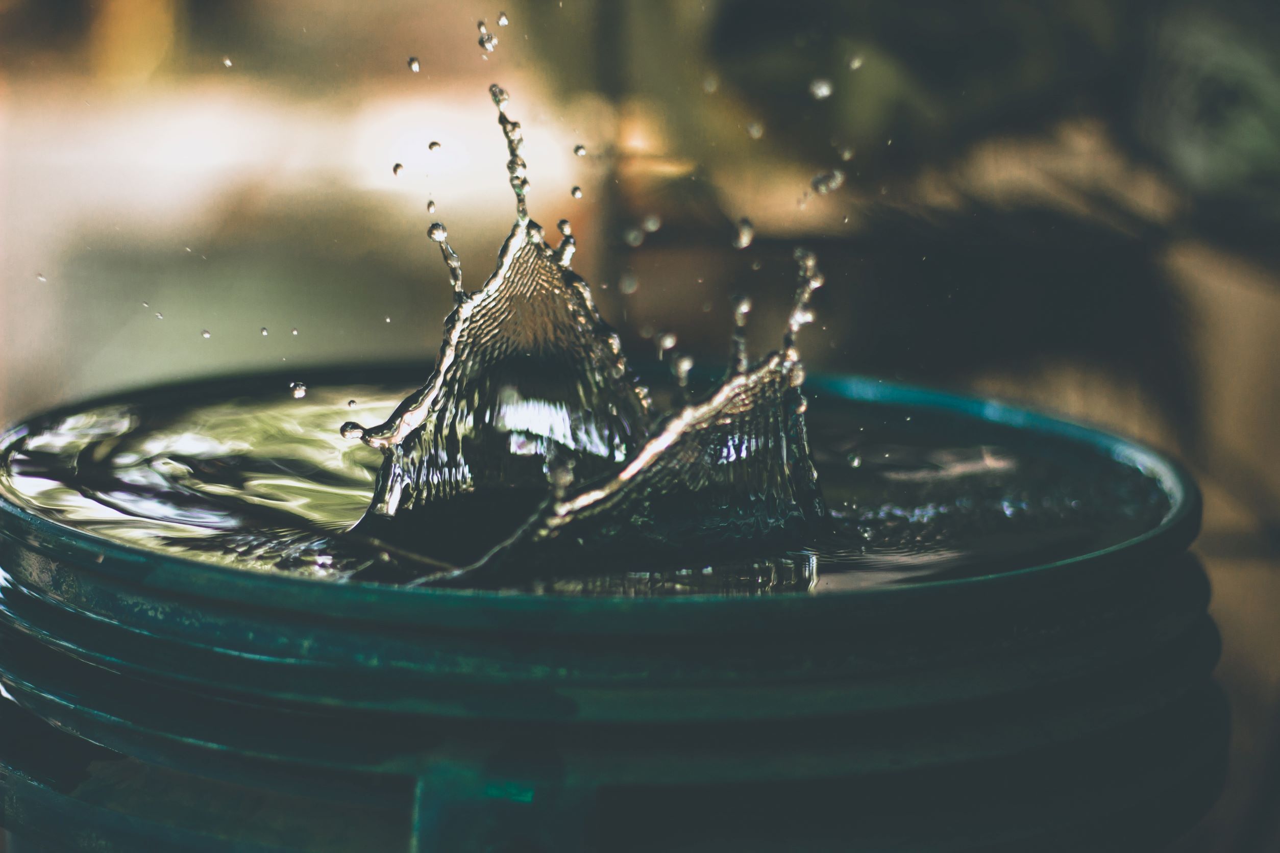 water dripping into a barrell