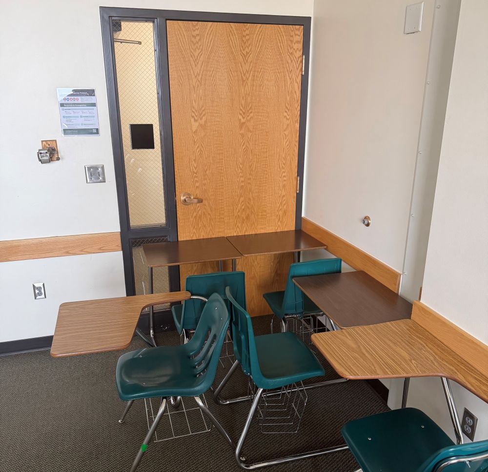 Barricade and leaveridge on an inward opening classroom door.