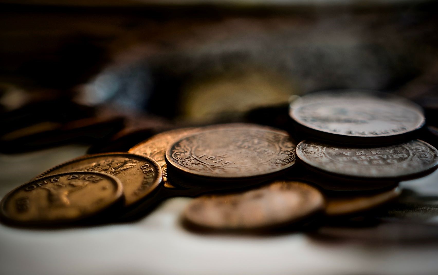 Old Coins - Photo by udit saptarshi on Unsplash