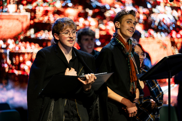 Students singing in a rehearsal for HUMBUG! the musical
