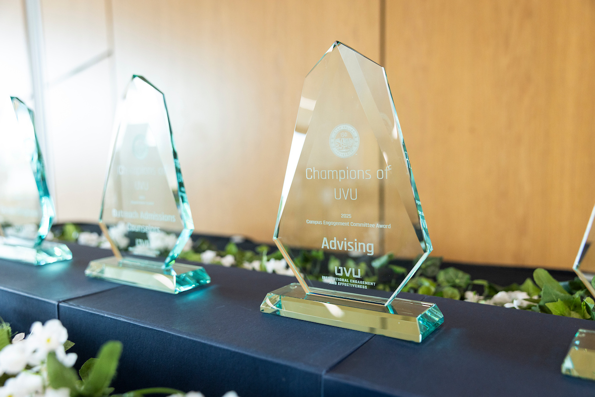 Glass Champion Award. The image is embellished with graphic elements.