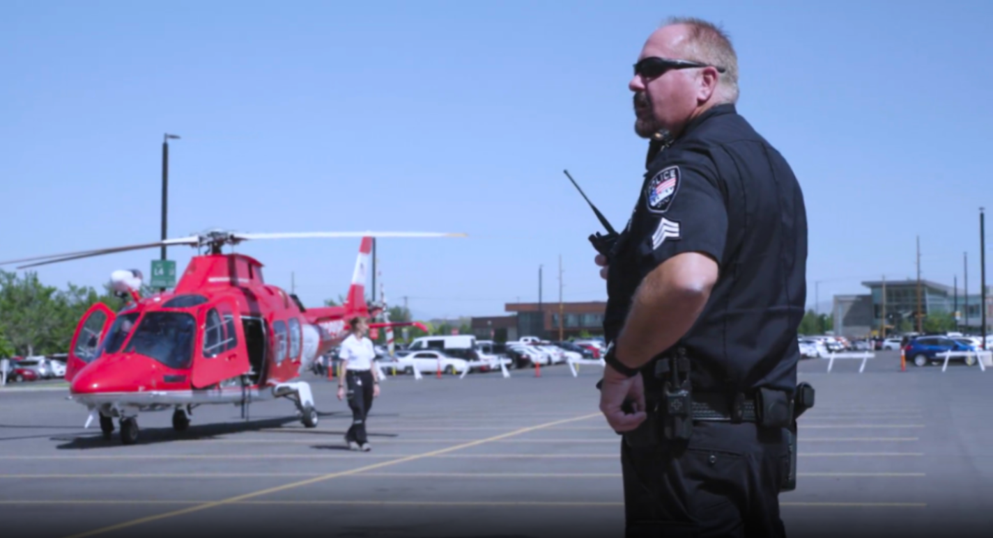 UVU Police Officer nearby Helicopter on UVU Campus