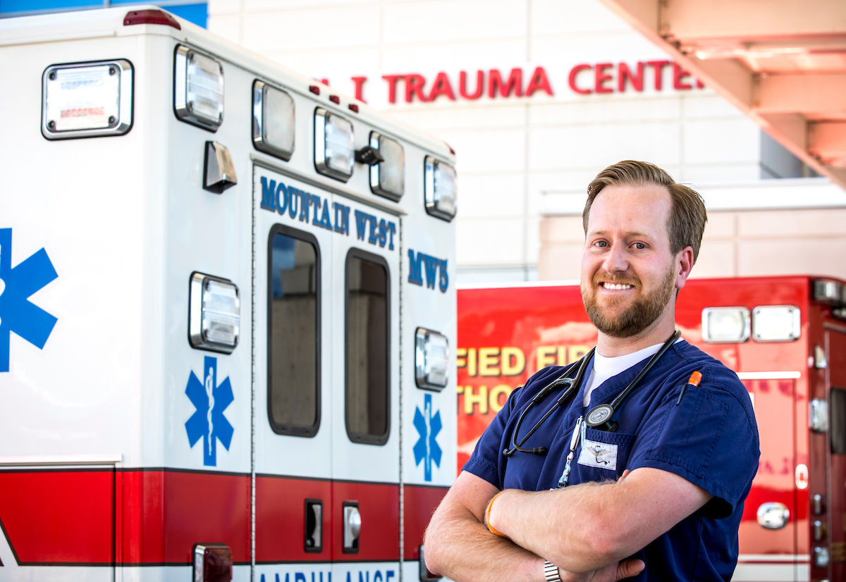 Paramedic outside the hospital next to his truck