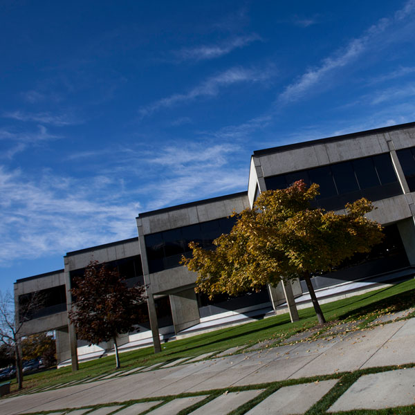 an exterior of UVU buildings linking to UVU scheduling policies and procedures