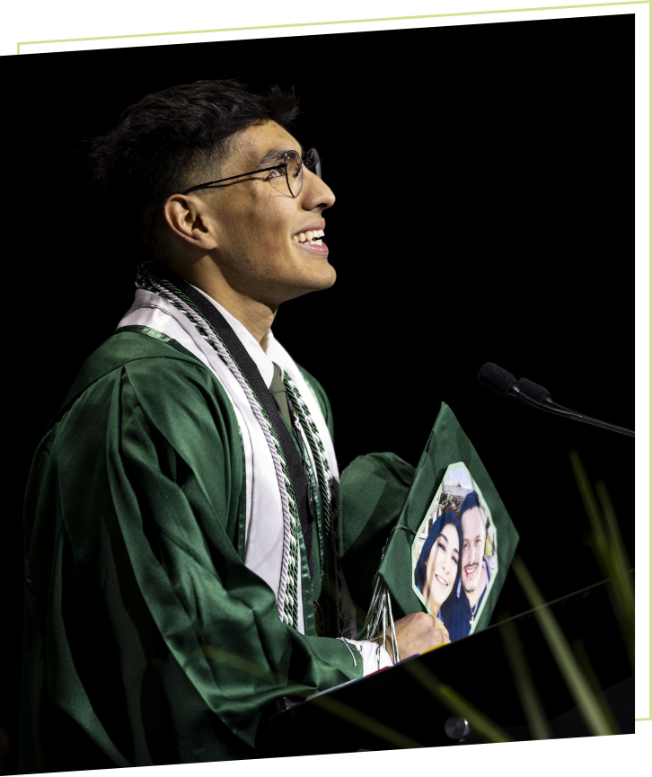 picture of graduate student speaking at convocation