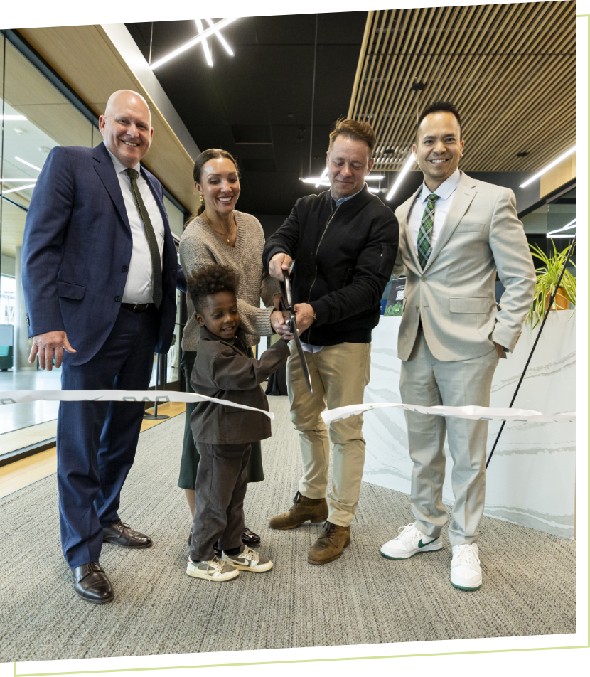 Baugh Family cutting cutting ribbon 