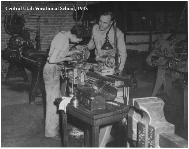 historic image of auto mechanic students working on metal lathe machine