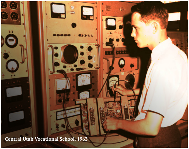 historic image of student on electrical board