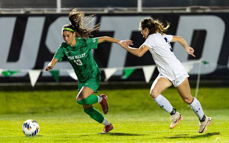 student athlete playing basketball