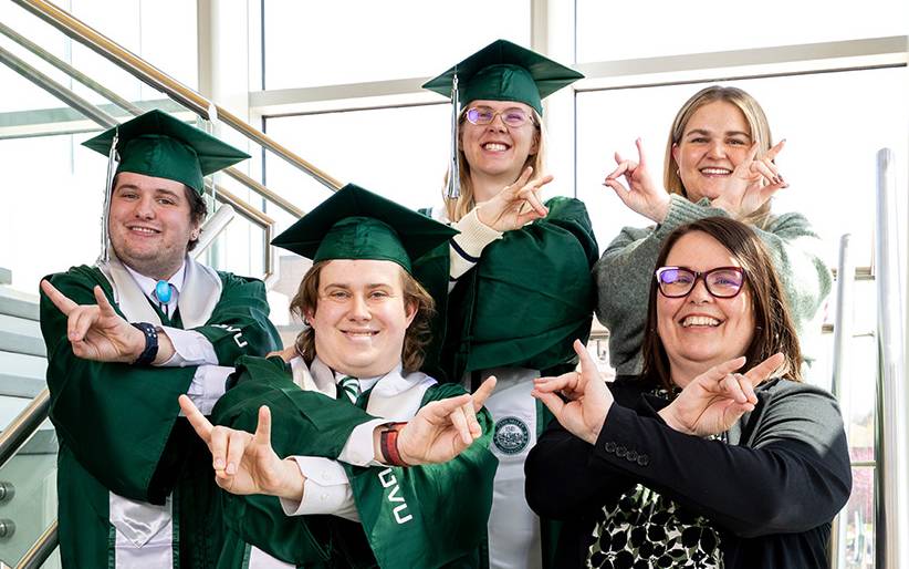 graduate studants in cap and gown