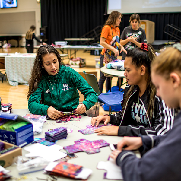 color image of students at women's success activity