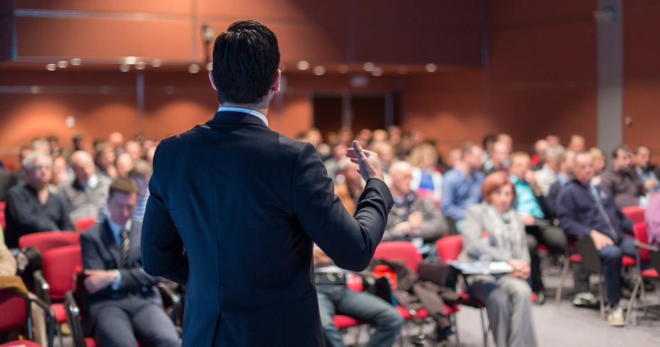 Man speaking at conference
